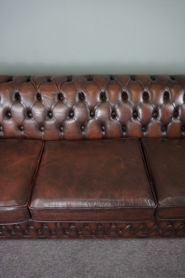 Chesterfield sofa in cowhide, 4 seats