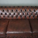Chesterfield sofa in cowhide, 4 seats