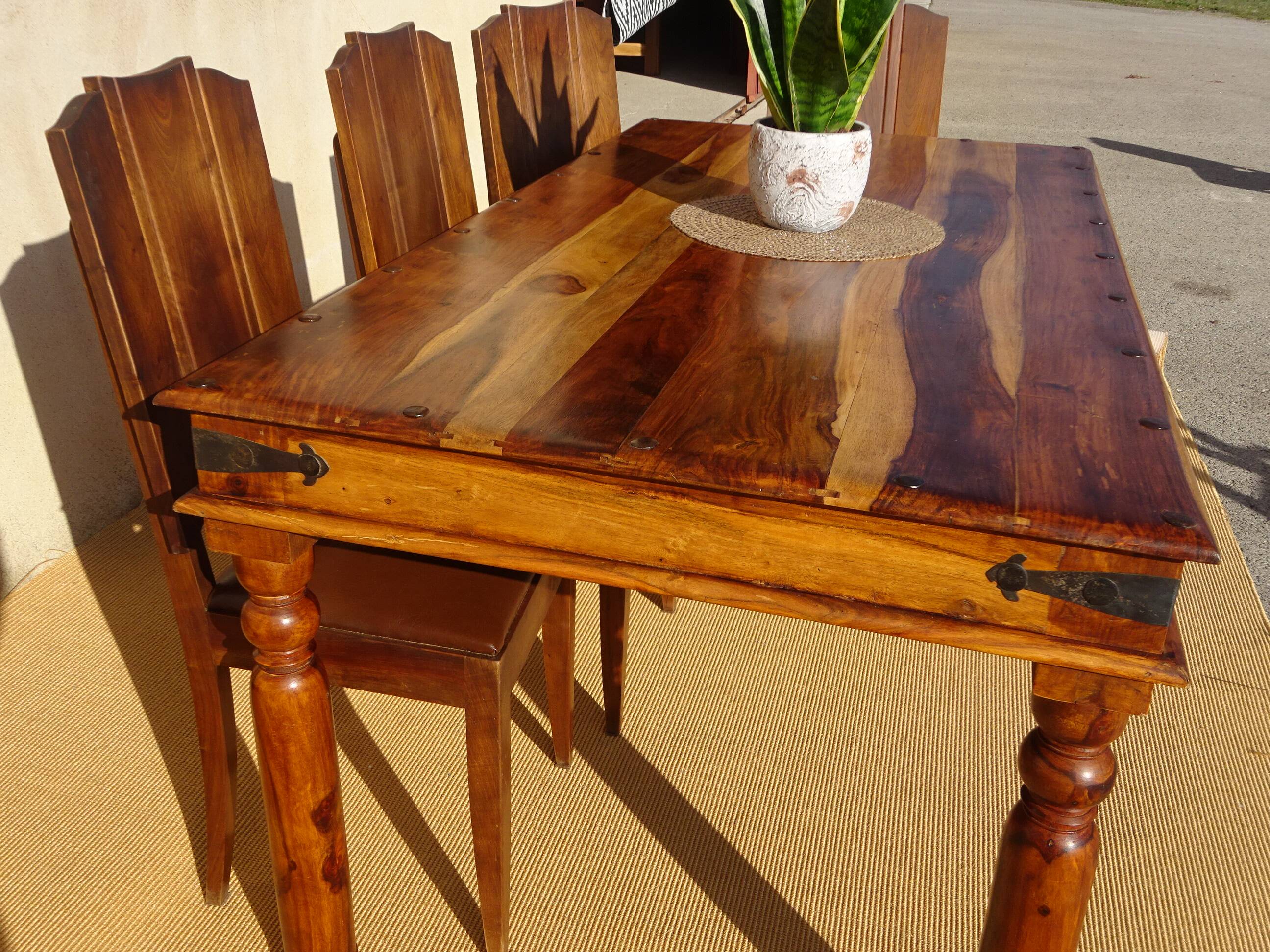Solid wood and wrought iron table