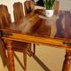 Solid wood and wrought iron table