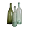 Ensemble de trois bouteilles anciennes