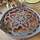 Red cast iron underside Le Creuset