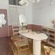 Natural travertine calypso oval dining table 240x100