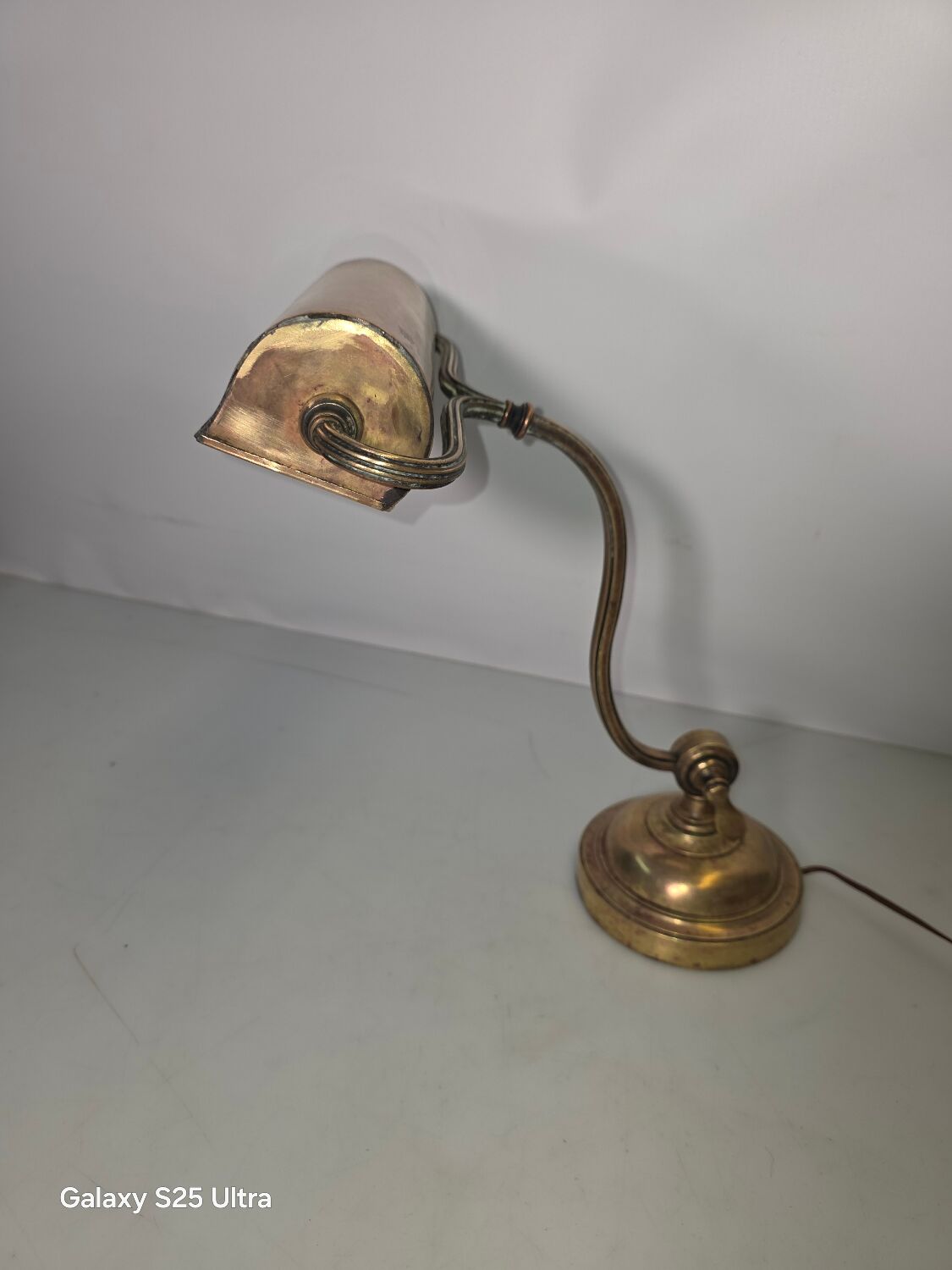 Antique brass desk lamp from a notary.