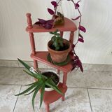 Old plant holder repainted in terracotta