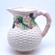 Pale pink slip decanter and colorful fruist