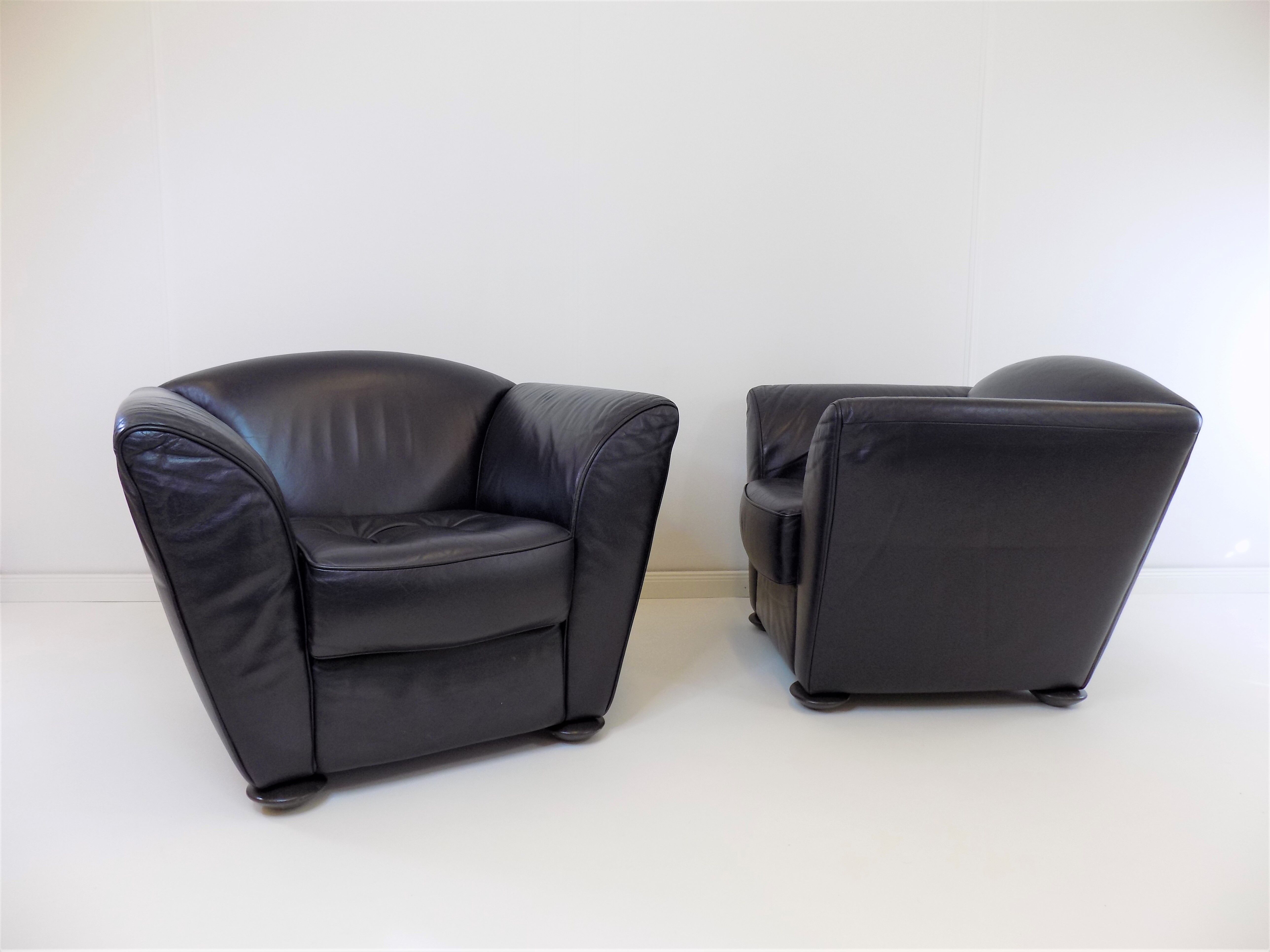 Set de 2 fauteuils en cuir par Peter Maly