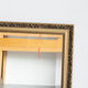 Miroir biseauté doré 93x64 cm