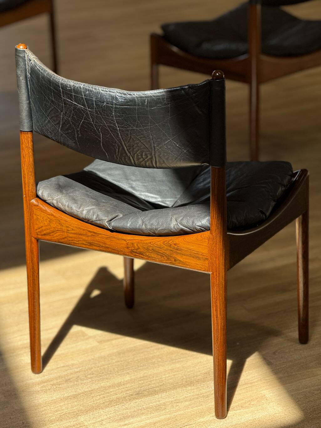 Extendable dining room table and chairs (by Kristian Solmer Vedel)