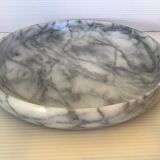 Empty round pocket in gray marble