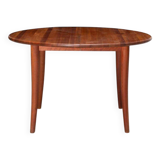 Dining table with a solid teak extension