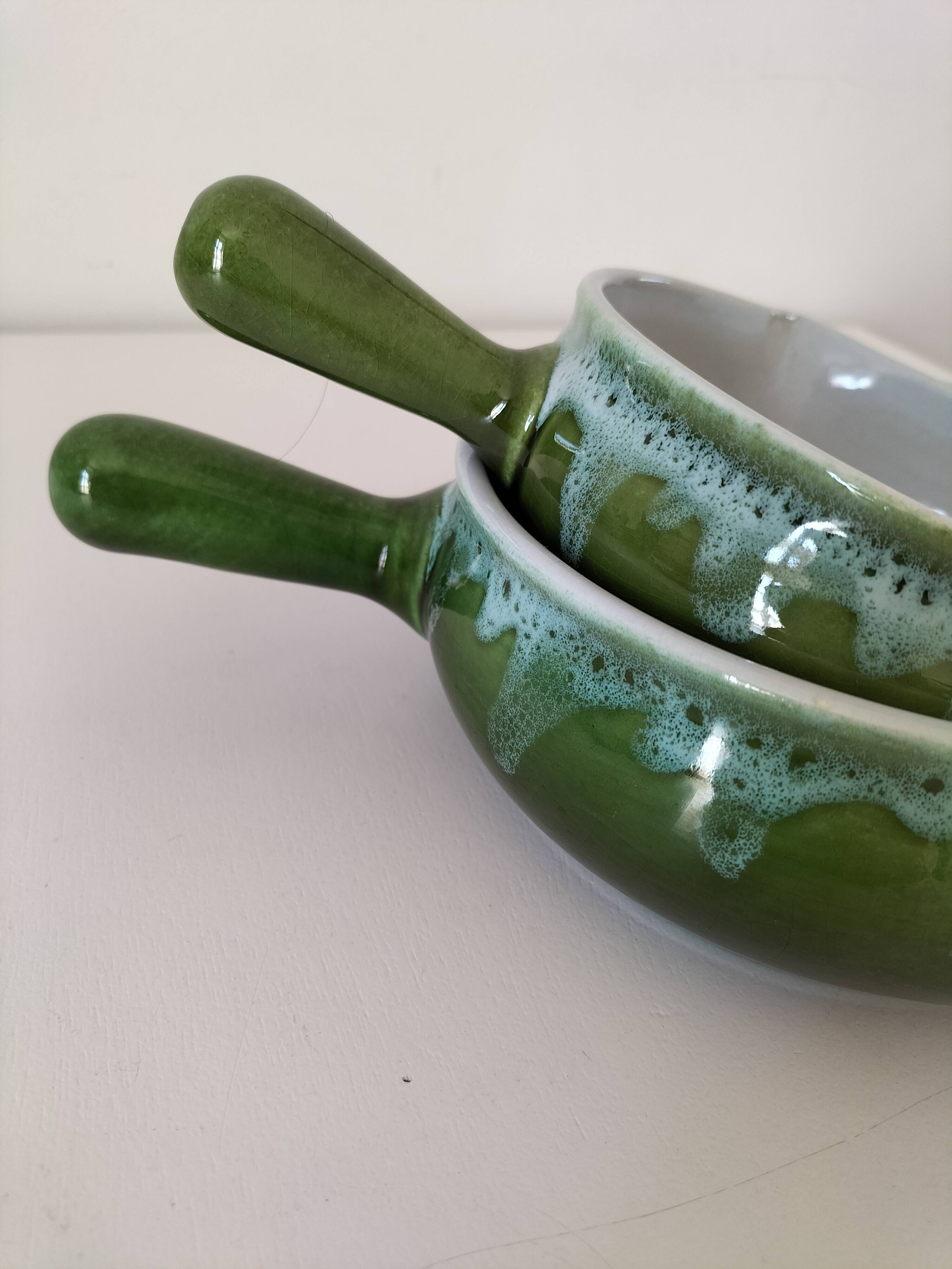 Duo of flowery caquelons