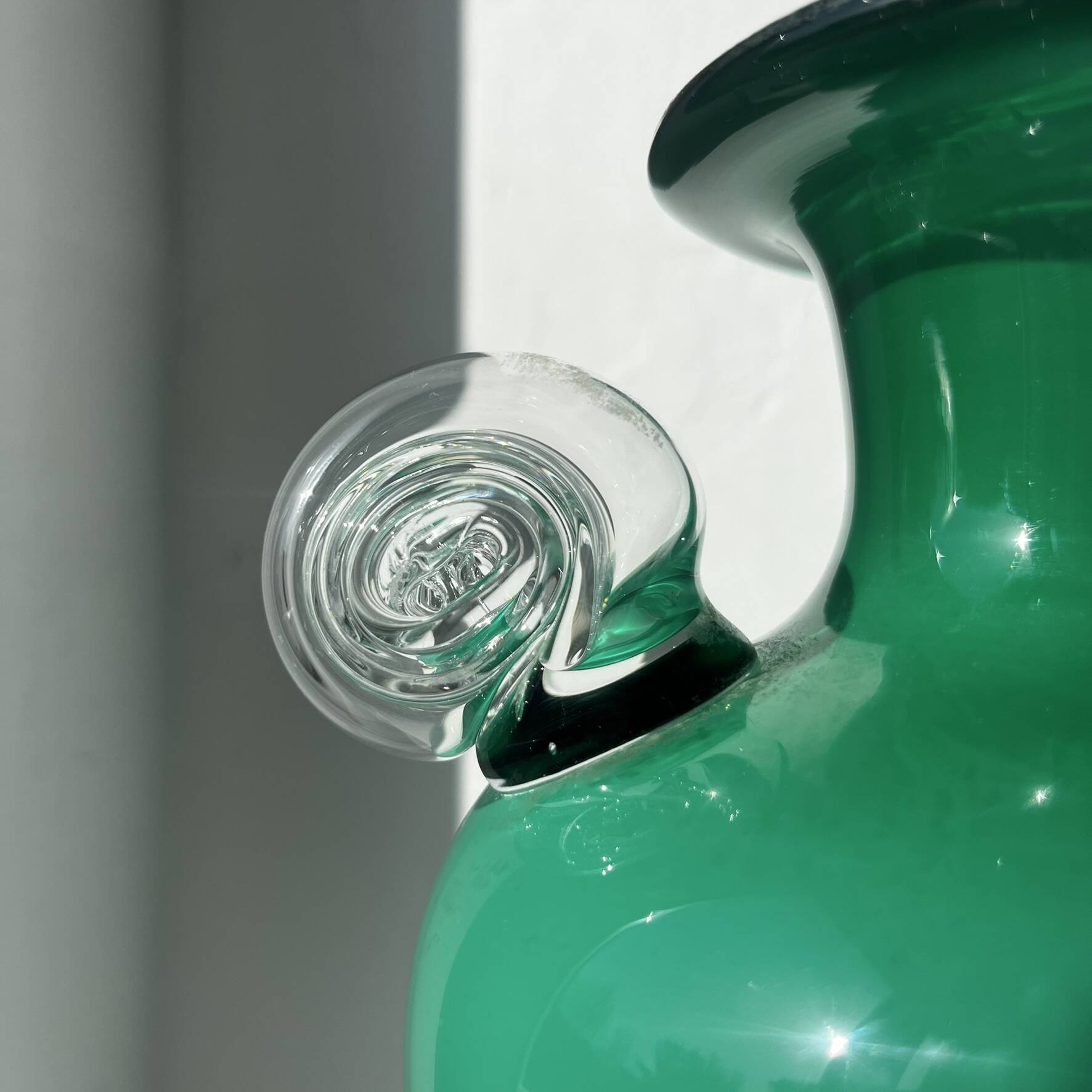 Green glass vase with a blown glass handle, Art Deco.