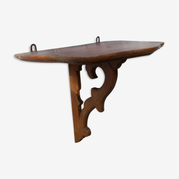 Étagère console en bois sculpté