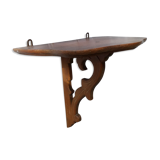 Carved wooden console shelf