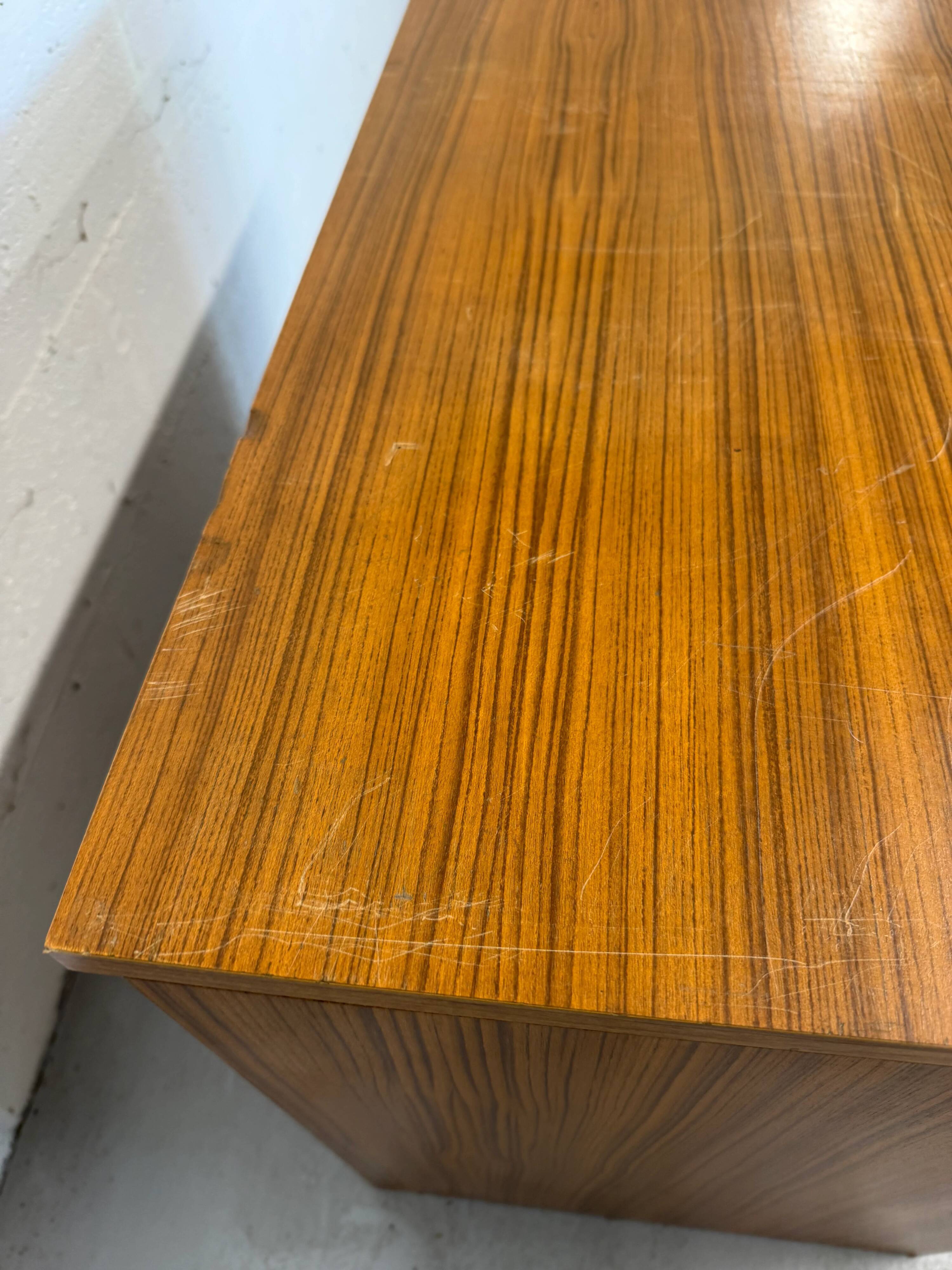 Vintage teak sideboard, mid-century style, with doors and drawers.