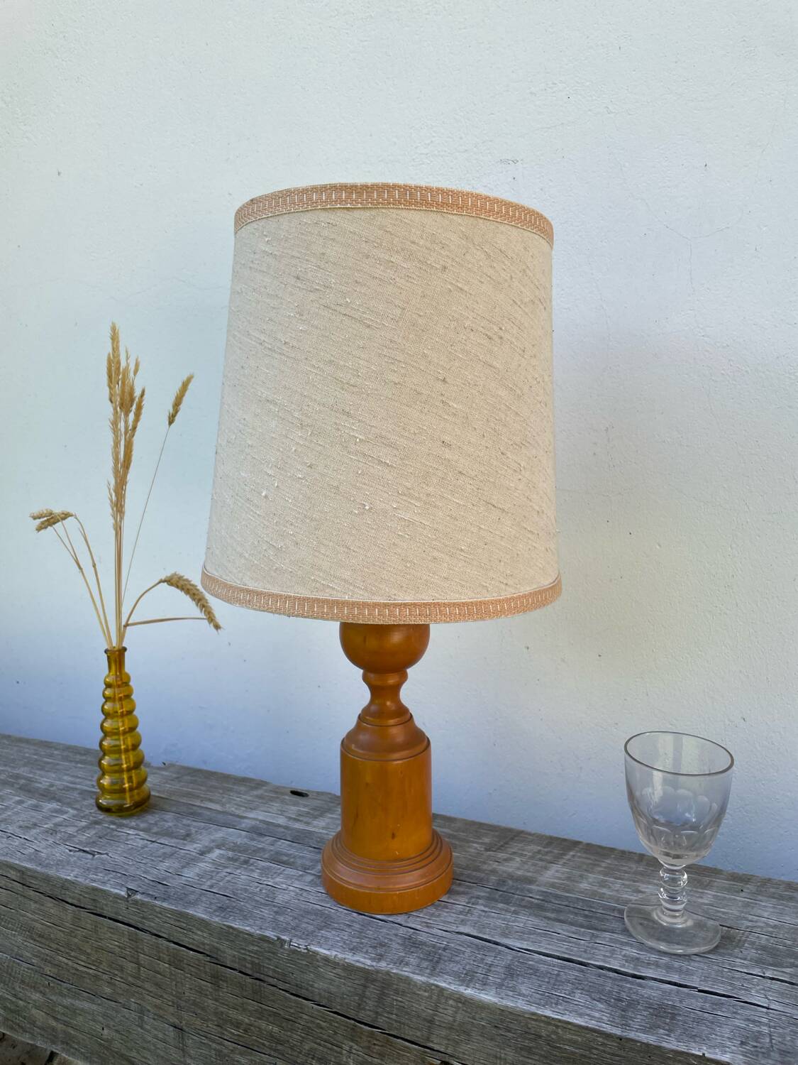 Old turned wooden lamp