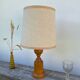 Old turned wooden lamp