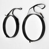 Jacques Adnet pair of circular leather and brass mirrors