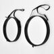 Jacques Adnet pair of circular leather and brass mirrors