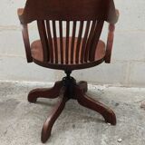 Old American office chair rounded around 1940 in oak