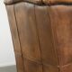 Comfortable cowhide wingback armchair with a timeless English look