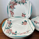 Set of 8 Digoin and Sarreguemines plates