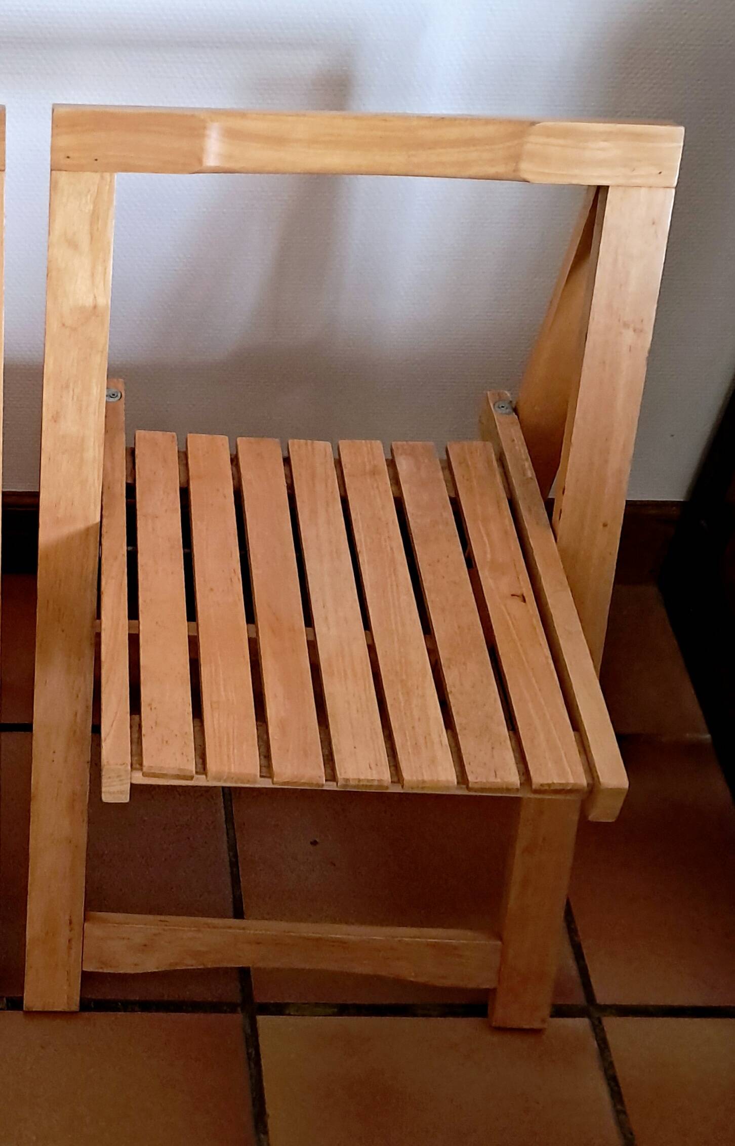 Wooden folding chair in the style of Aldo Jacober