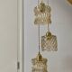 Triple antique globe pendant light in amber glass