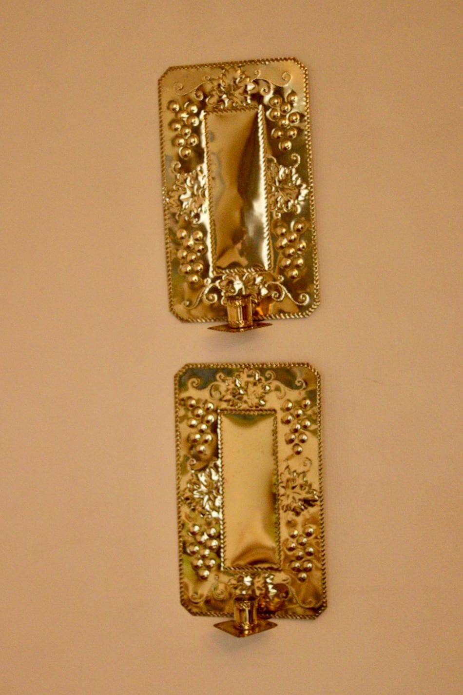 A pair of Swedish brass wall sconces from the mid-century.