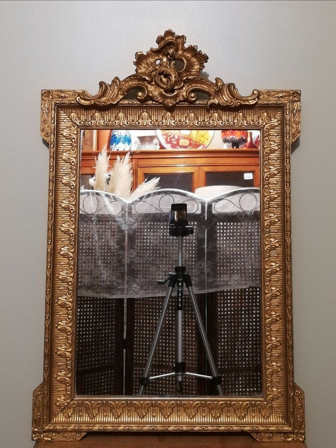 Mirror with pediment rocaille in gilded wood and stucco Louis XV style