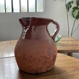 Glazed earthenware jug