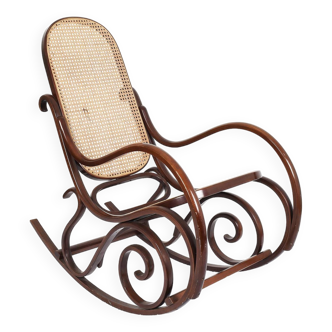 Rocking chair, cane rocking chair. Made of turned wood in the Thonet style.