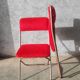 Pair of folding chairs in vintage red moumoute