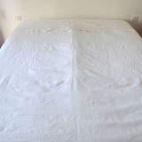 White sheet in monogrammed linen