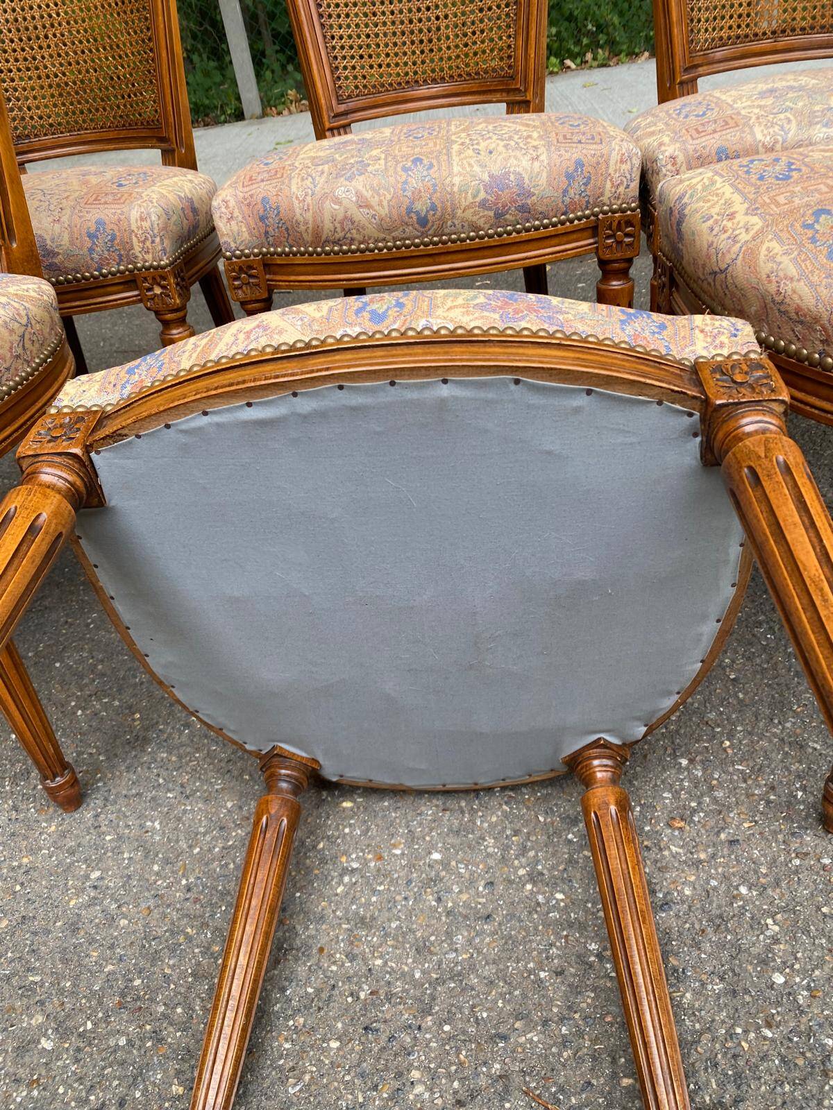 Set of 6 Louis XVI style chairs with caned backs and 70s jacquard fabric.