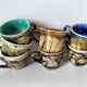 Tasses et soucoupes Morvan en céramique émaillée polychrome