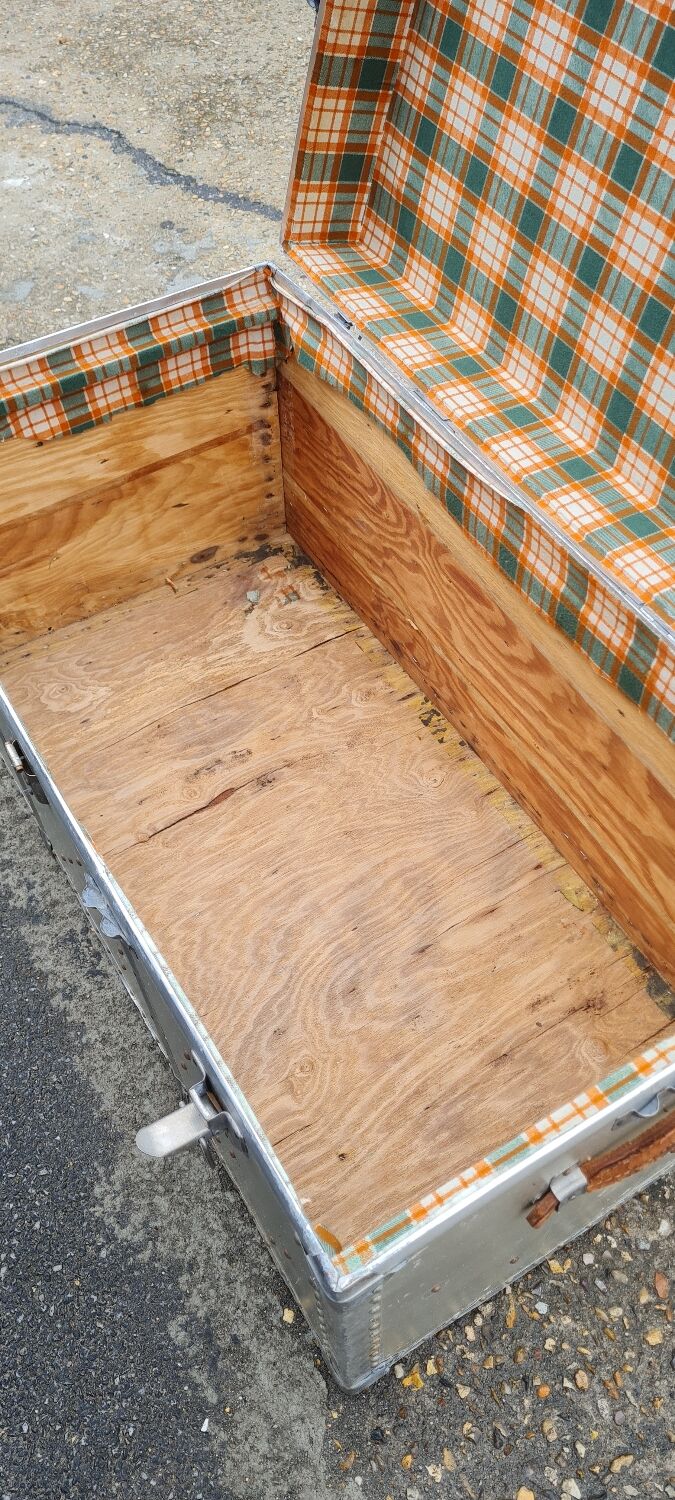 Riveted metal transport trunk