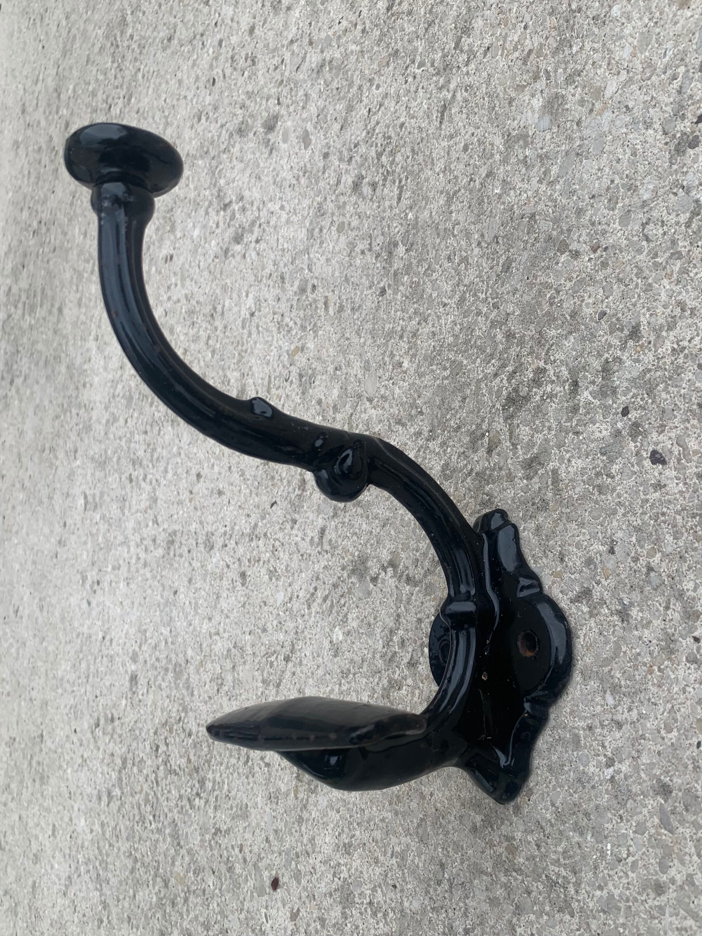 Set of 5 old cast iron hooks