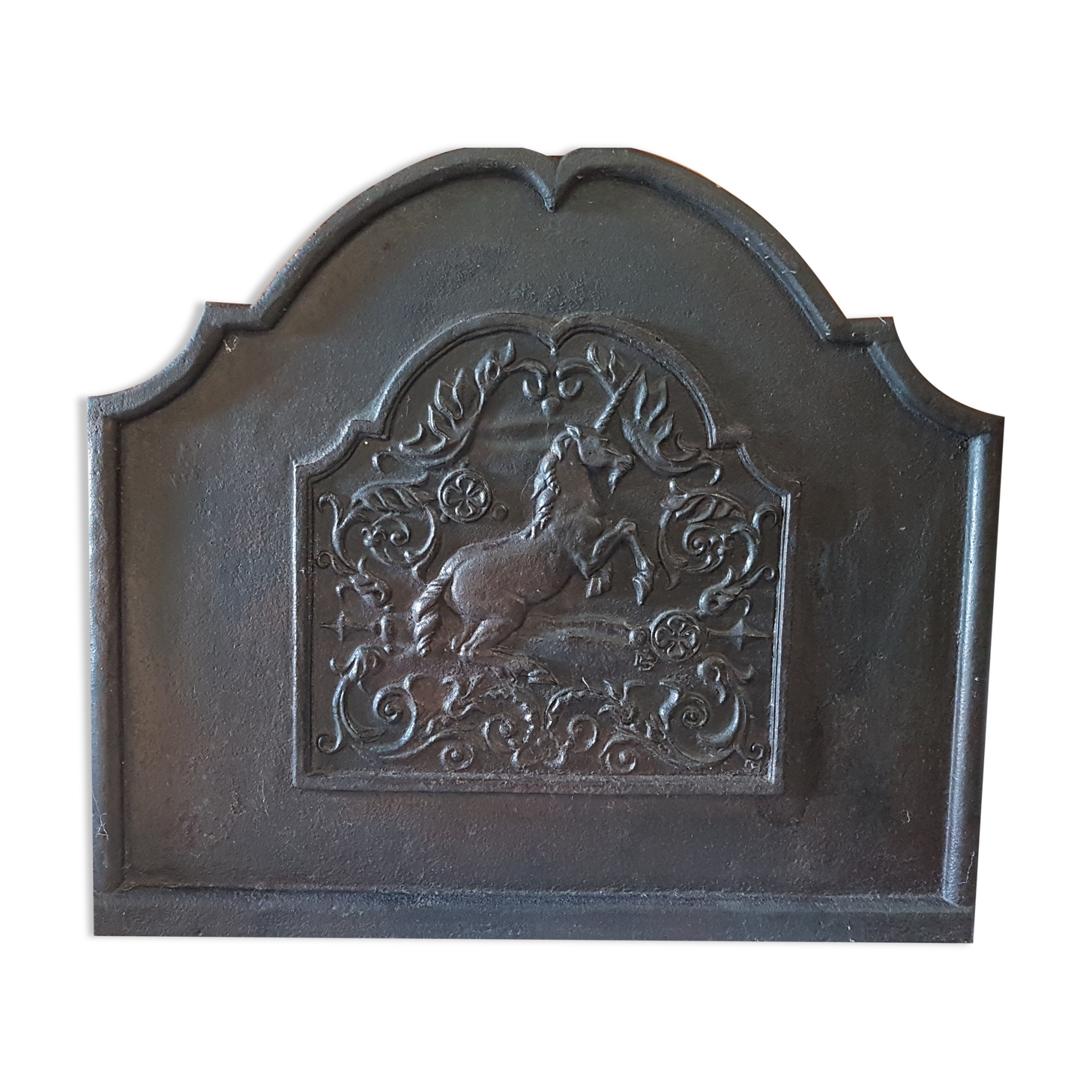 Old cast-glass fireplace plate