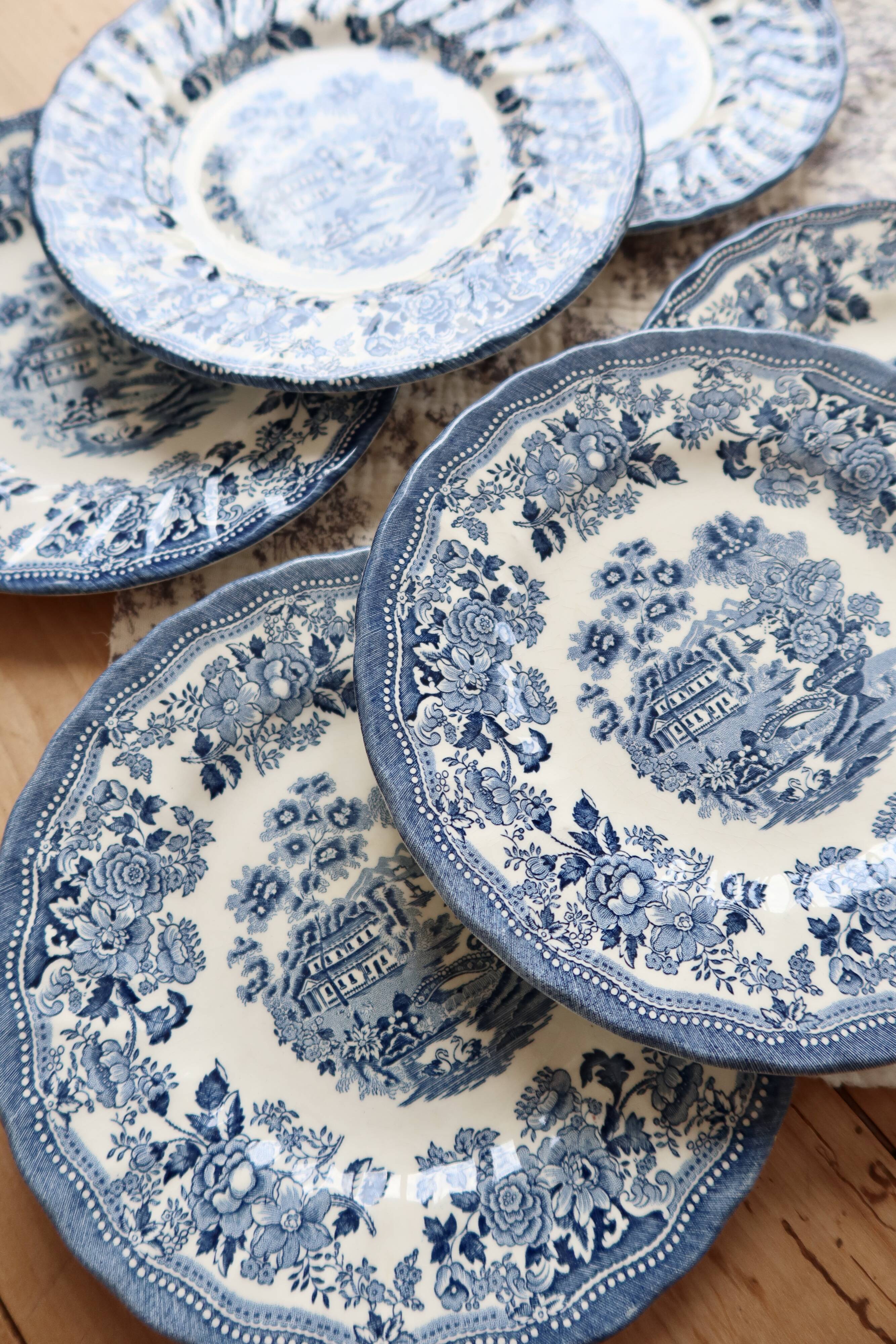 6 English dessert plates by Churchill with a romantic blue design.