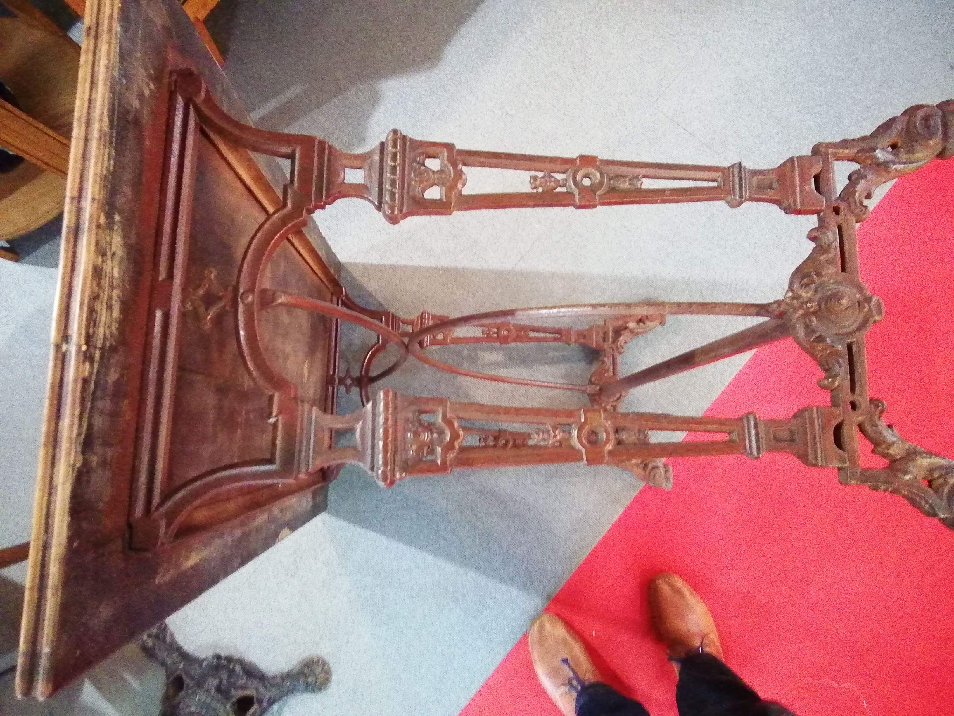 Bistro table over wood cast iron legs