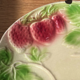Plate in slip decoration strawberries and leaves