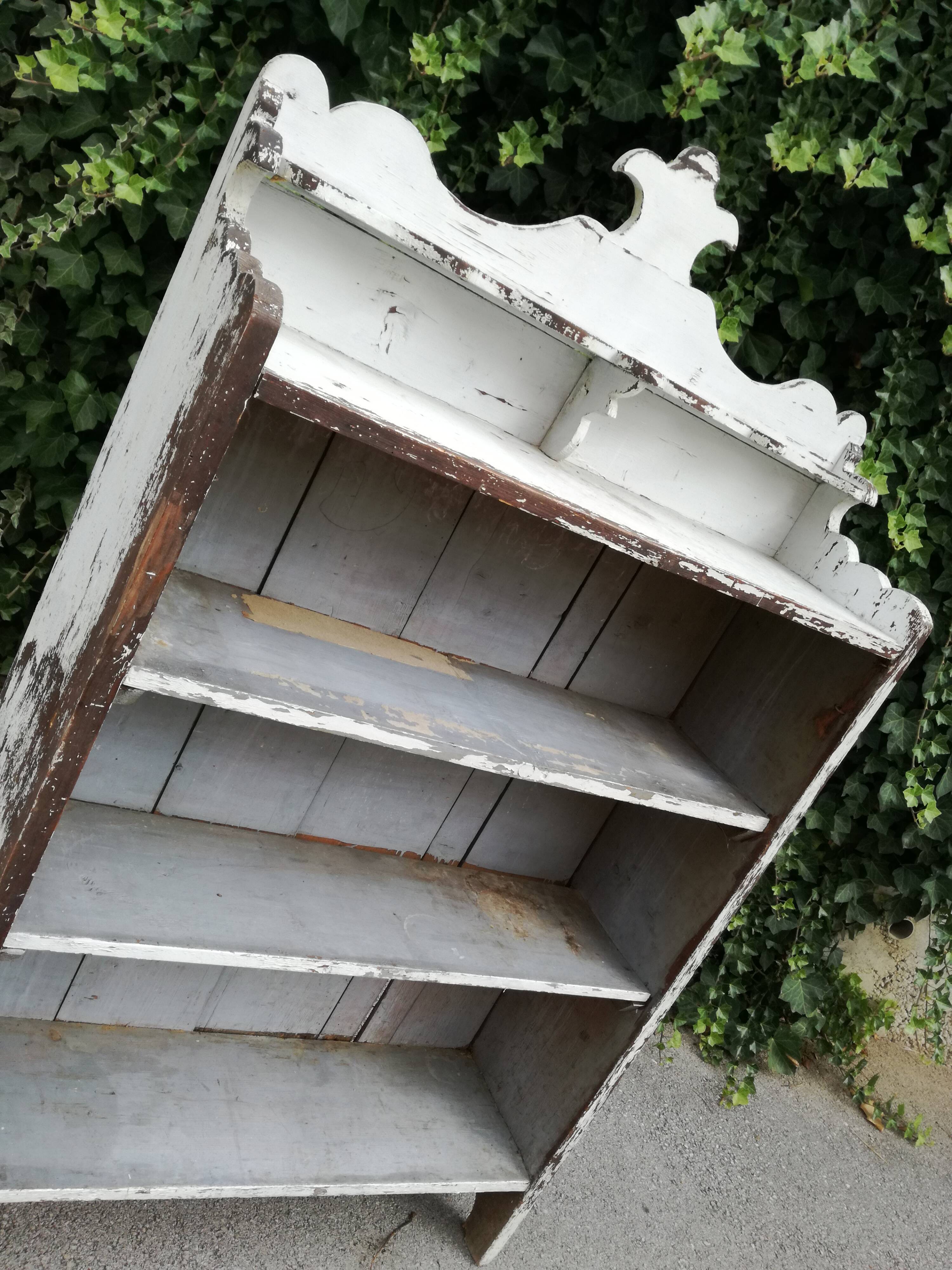 Old white shelf in weathered pine