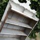 Old white shelf in weathered pine