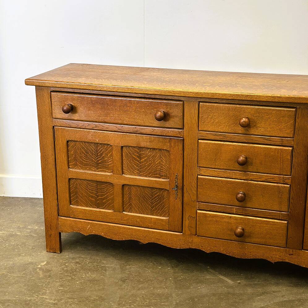 Vintage french oak sideboard with wavy details, ca. 1950s