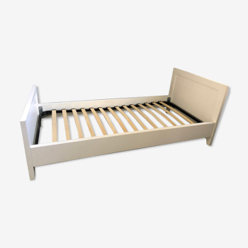 Lindart single bed in solid wood painted white.