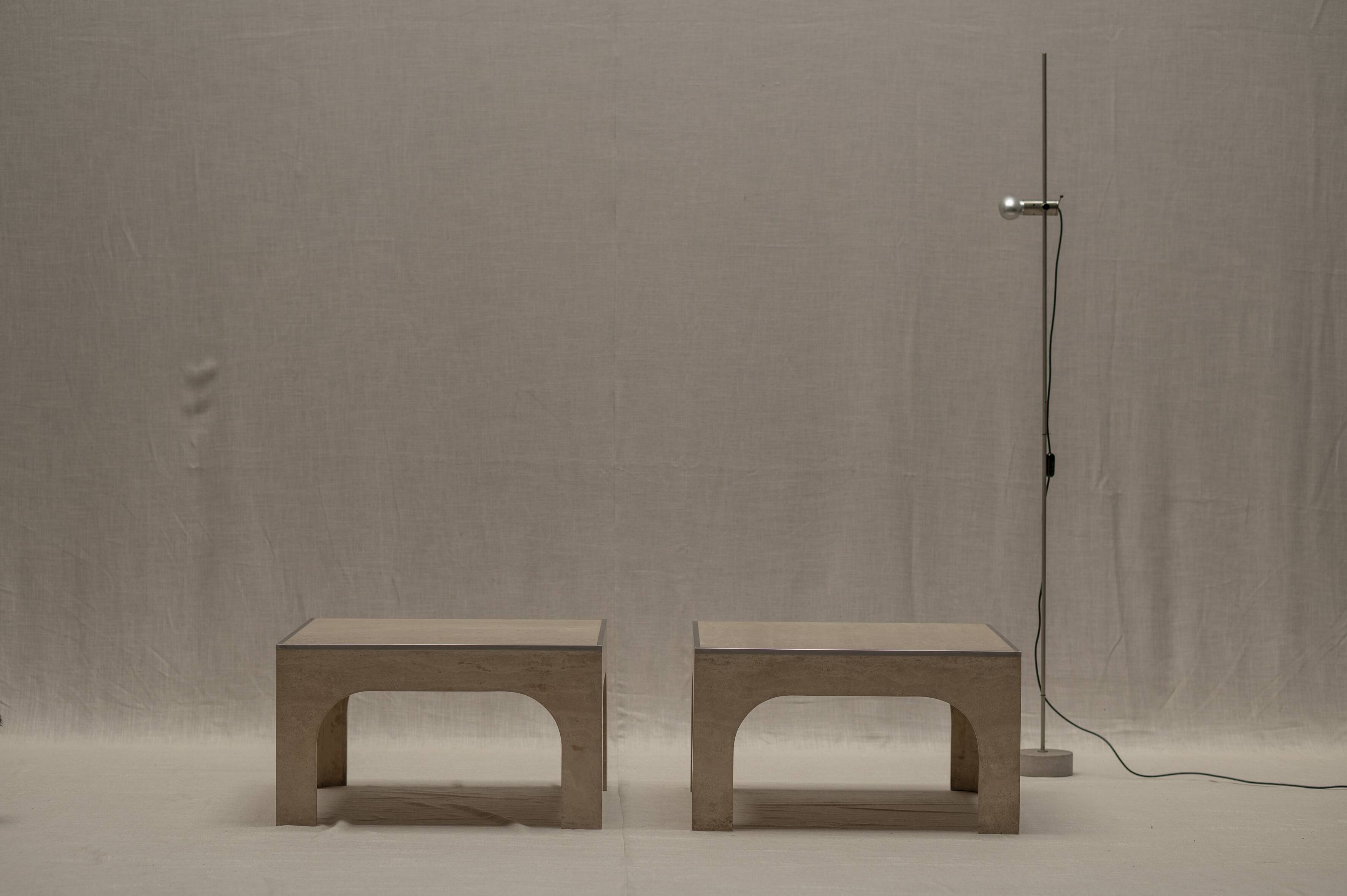 Architectural set of travertine coffee tables