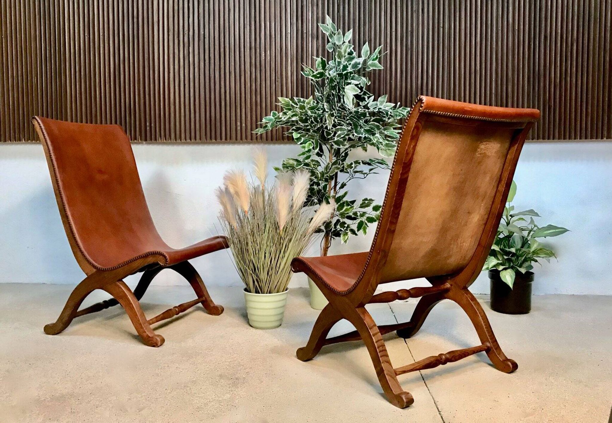 Set of 2 Spanish high-back leather slipper chairs by Pierre Lottier, 1950s