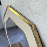 Octagonal mirror in white lacquer with brass surround
